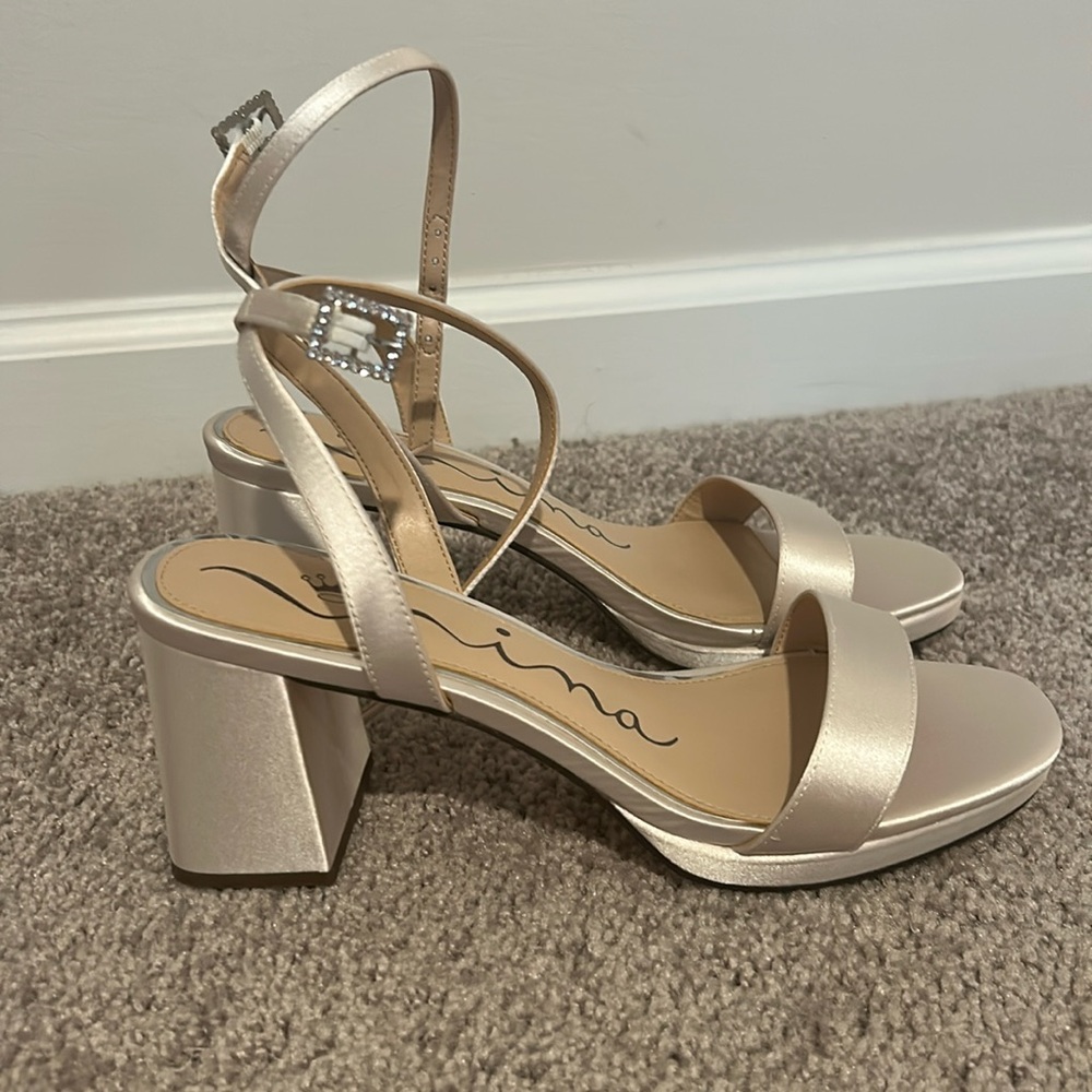 Brand new never worn ivory Nina heels